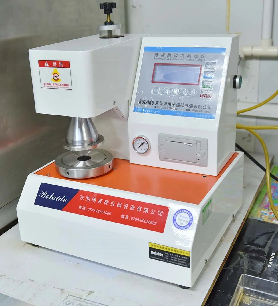 Paperboard puncture resistance tester